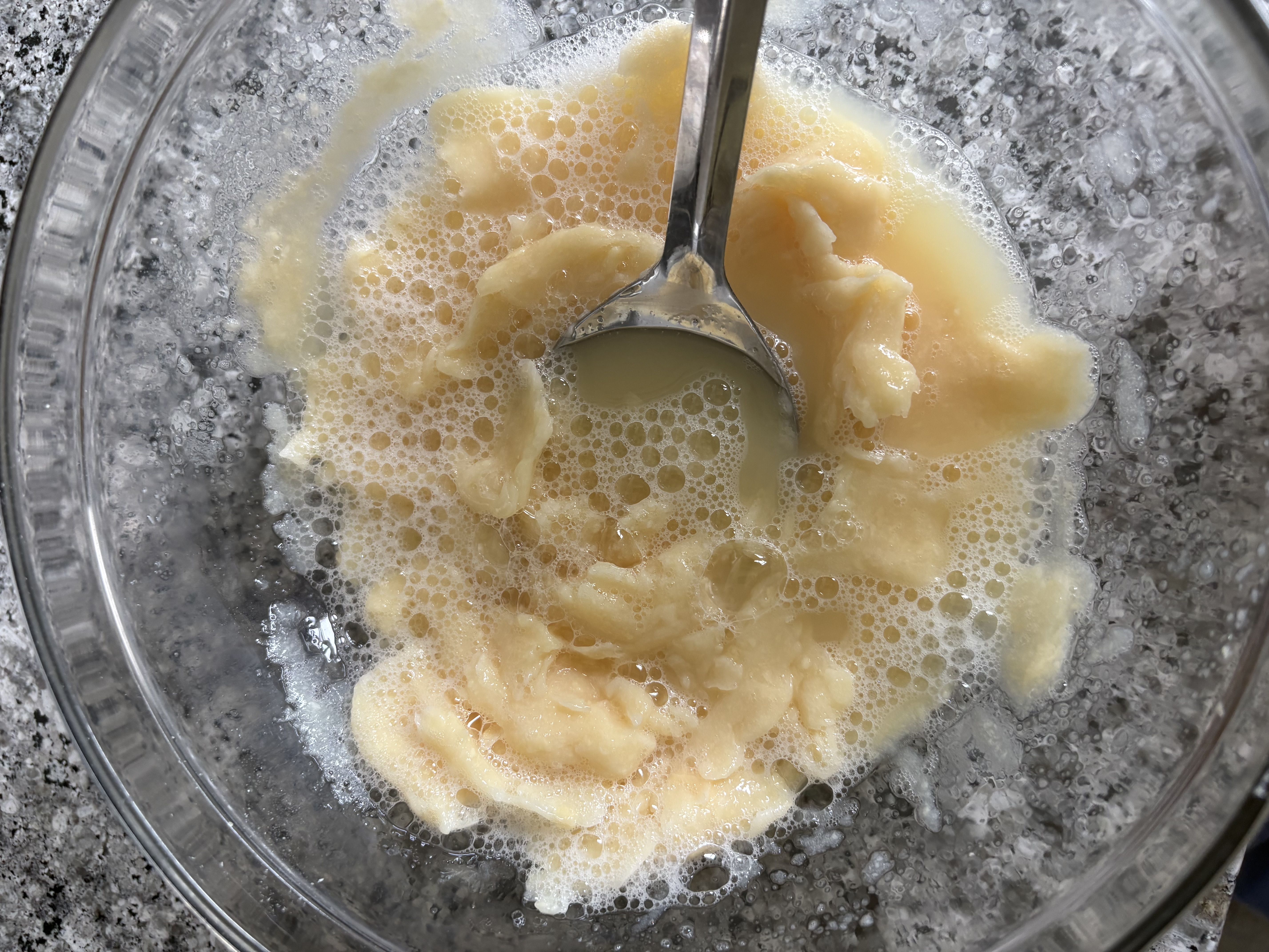 The process of mixing boiling water with the grated soap.