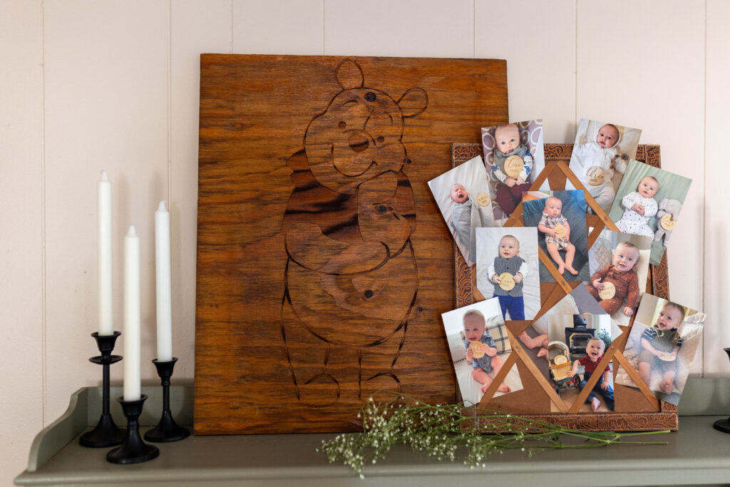 wooden board with winnie the pooh engraved on it