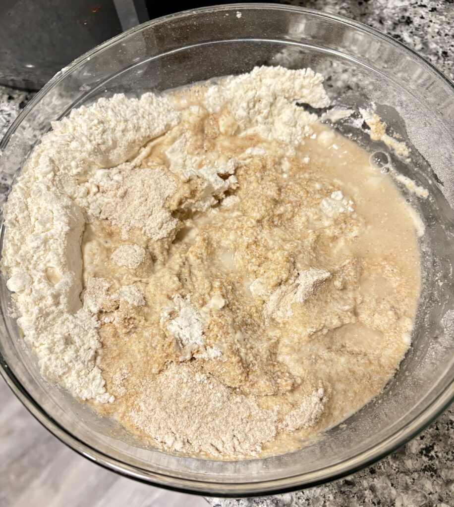 Mixing together the flours and water.