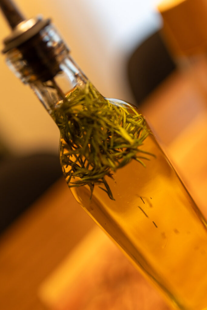 herb-infused olive oil at a slant