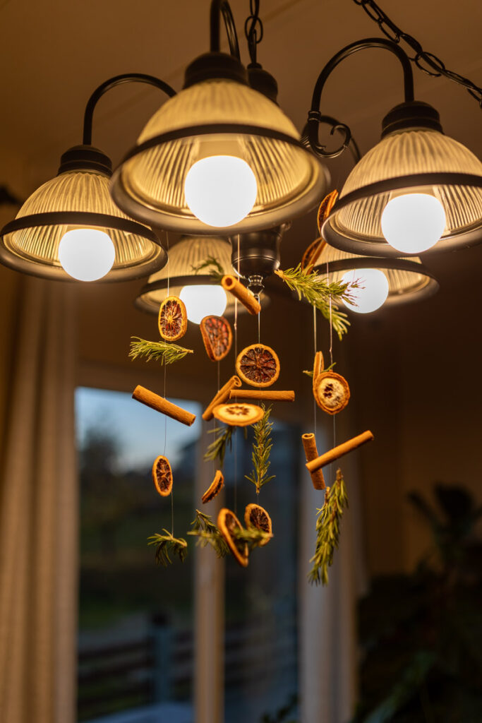 dried oranges, rosemary, and cinnamon sticks hanging
