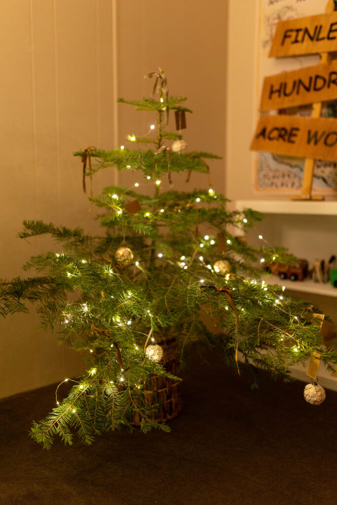little christmas tree in a basket
