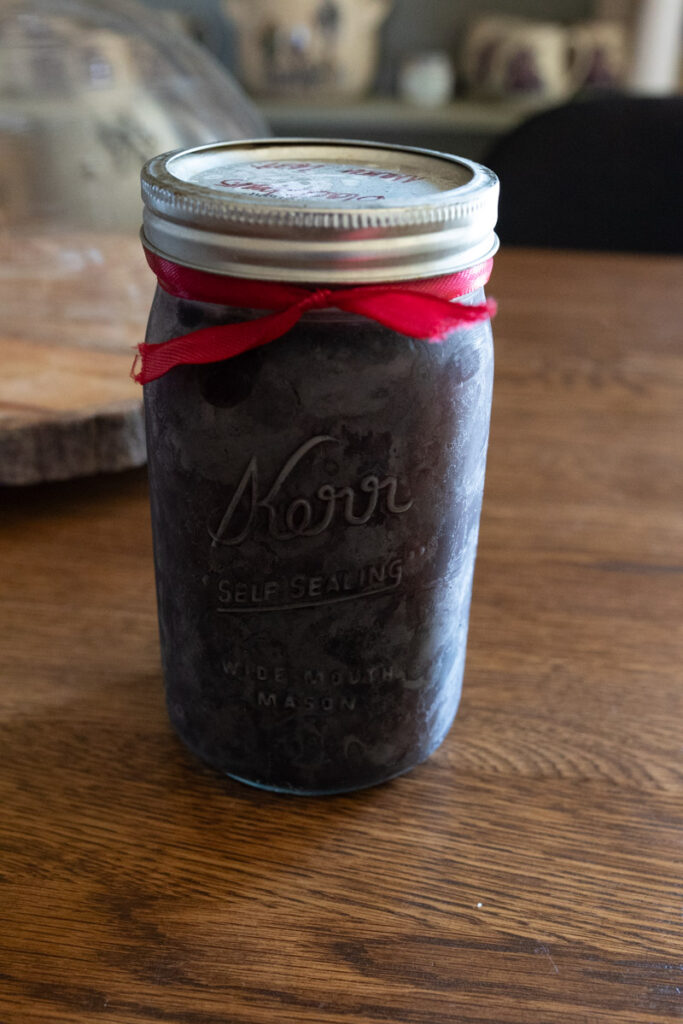 elderberry syrup in a mason jar