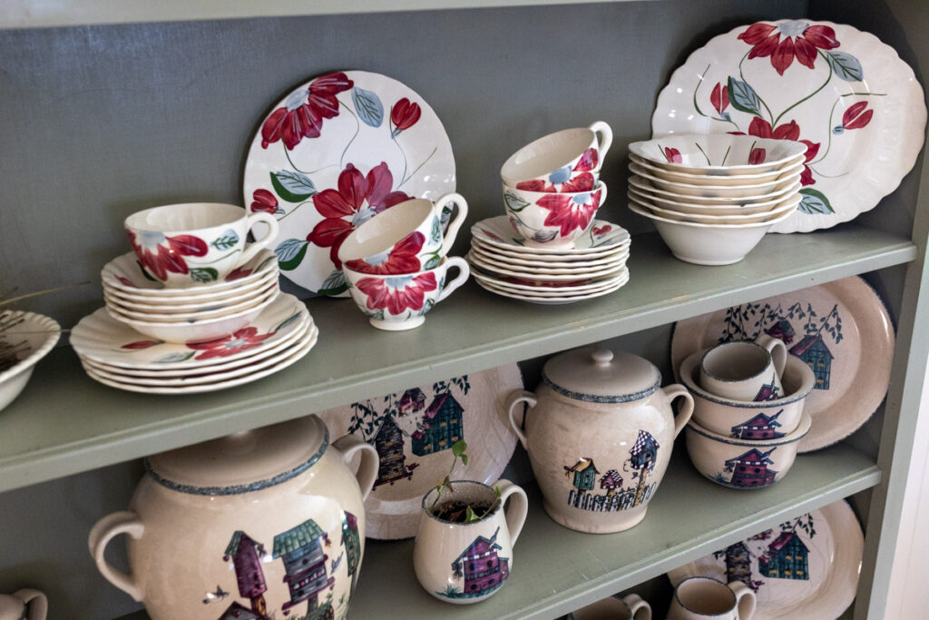 dishes on a green hutch