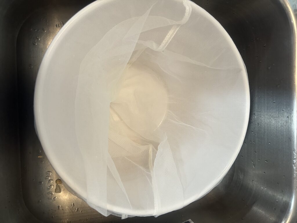 prepared cheesecloth in a large bowl