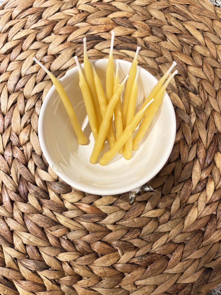 The end result! 12 Beeswax birthday candles.