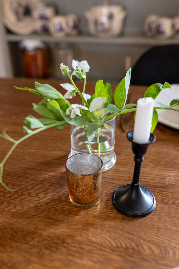 sweet pea flowers and candles
