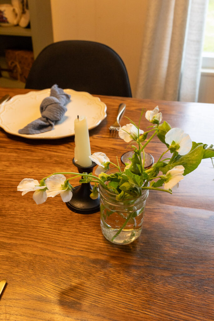 sweet pea flowers and candlestick