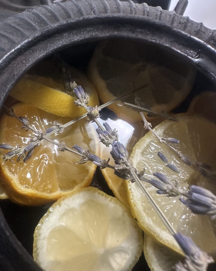 close up shot of lemon and lavender in kettle