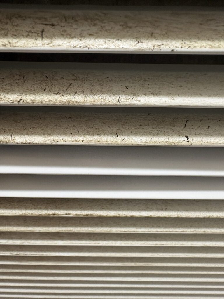 A close-up shot of the return vent.