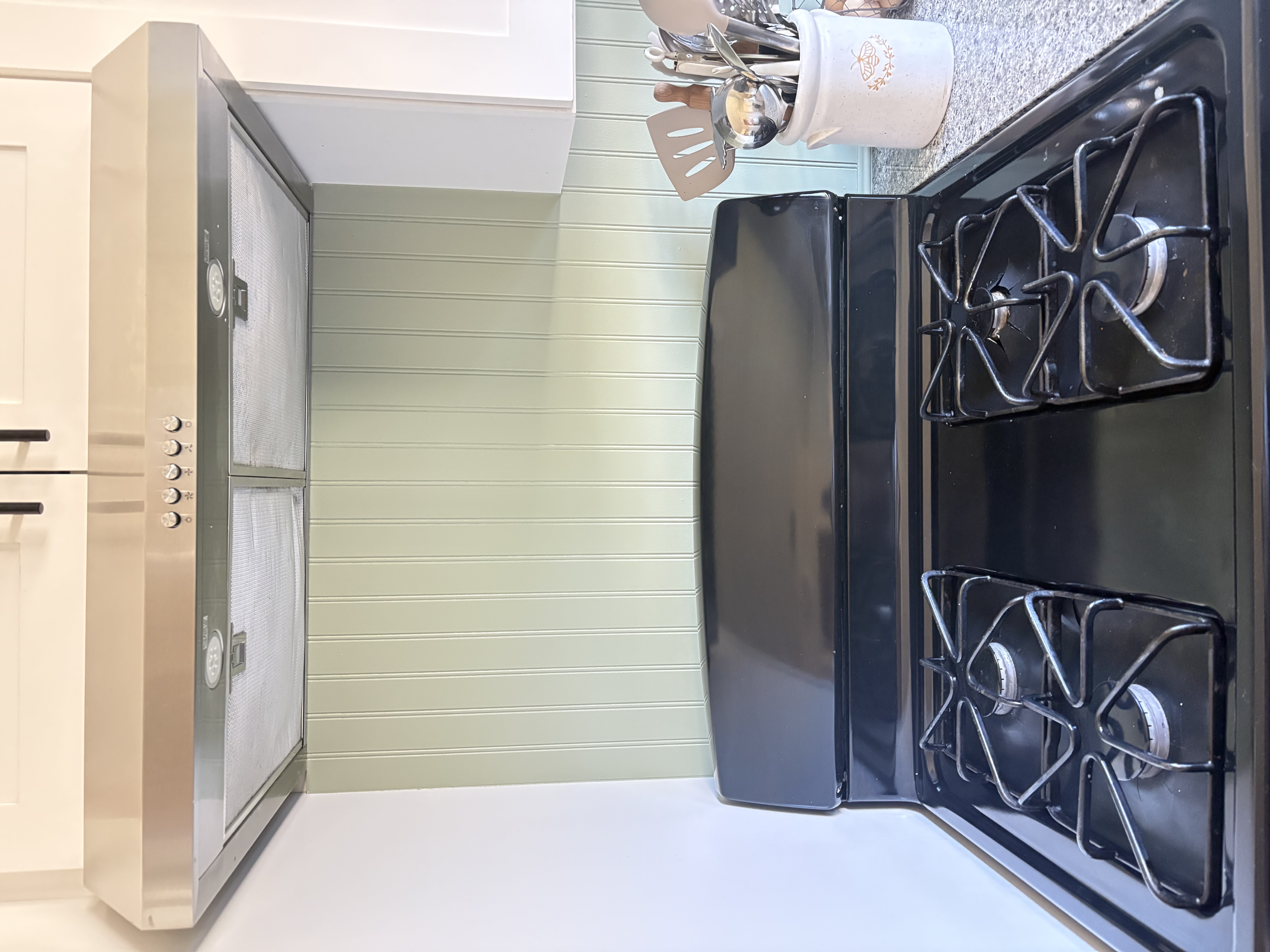 A close-up shot of the oven, where I want to put up a painting.